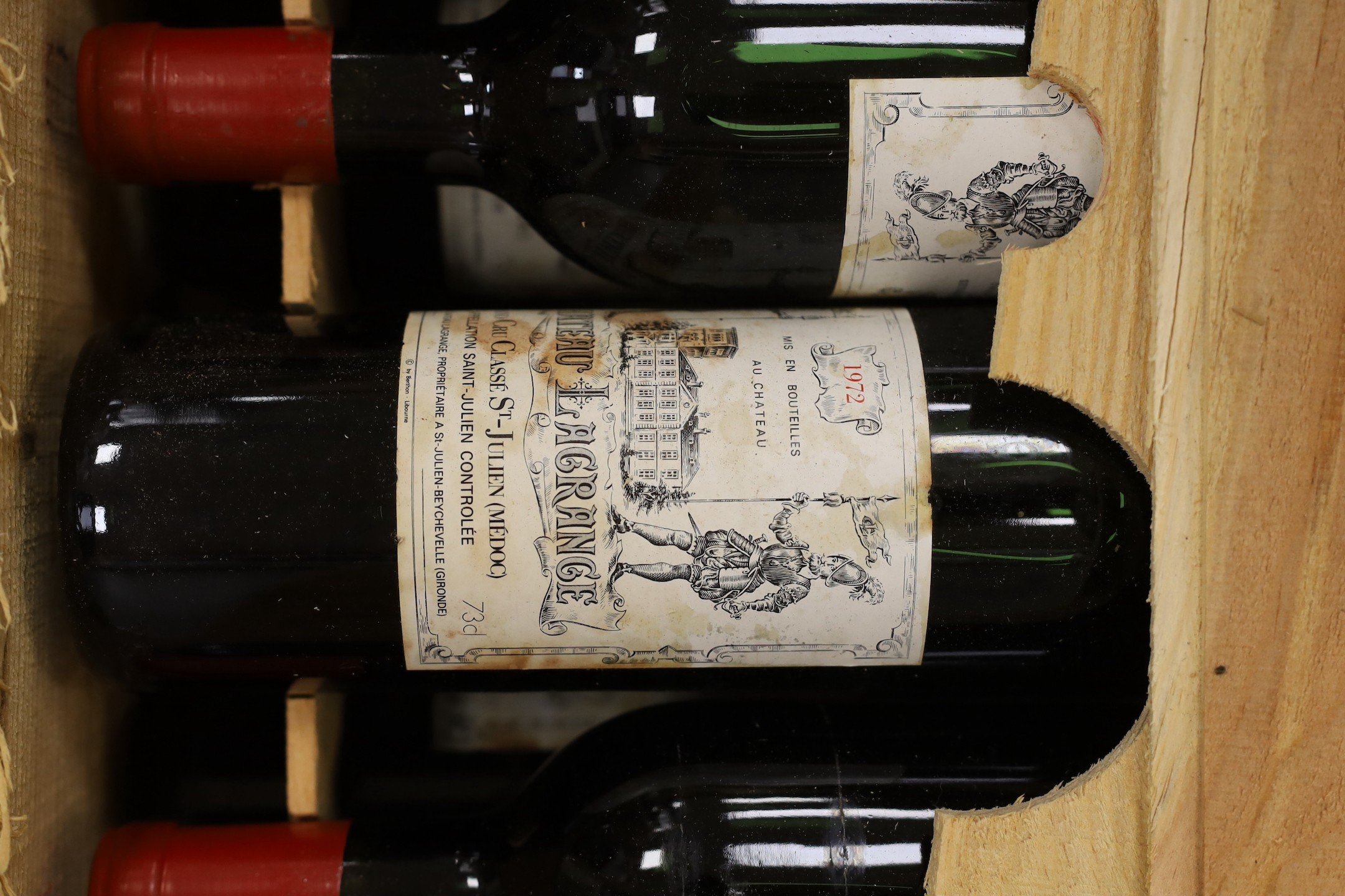 Twelve cased bottles of Chateau L'Agrange 1972